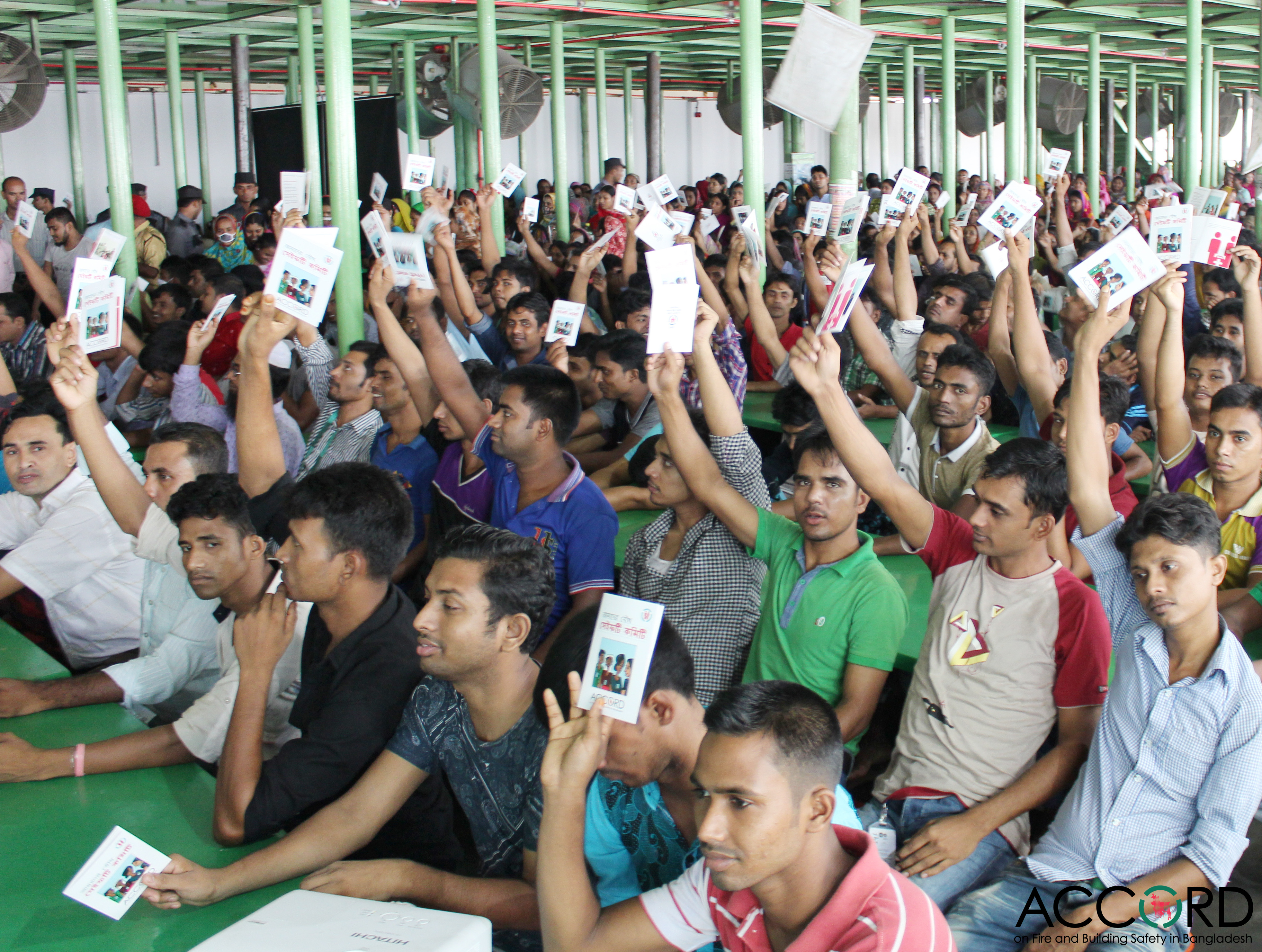 Workers participate in an all-staff safety meeting organised by the Bangladesh Accord.