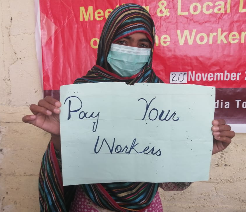 #PayYourWorkers action, photo by HomeNet Pakistan