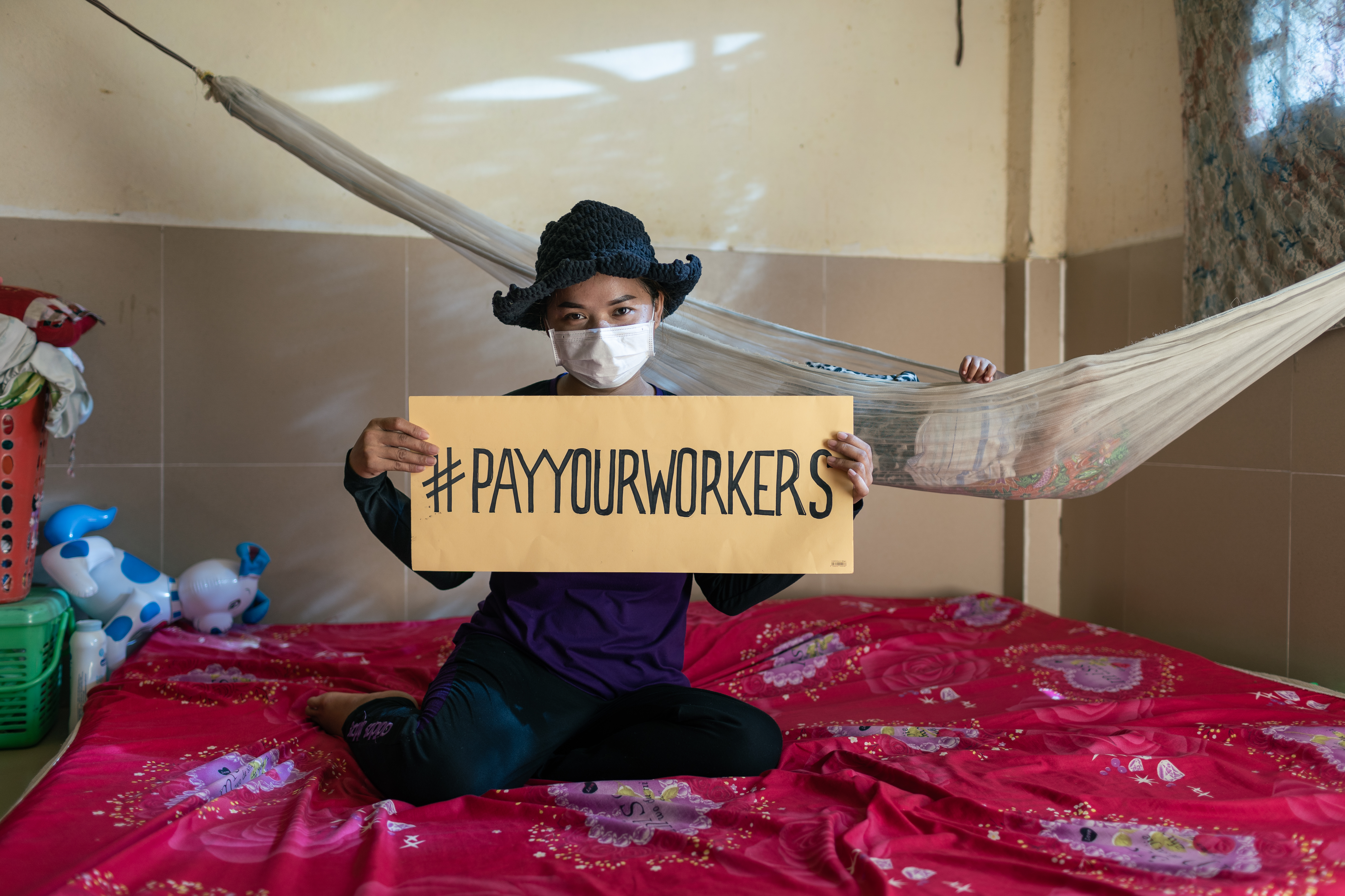 Cambodian worker urging for full payment of wages as part of the Pay Your Workers campaign, Photo: Enric Catala